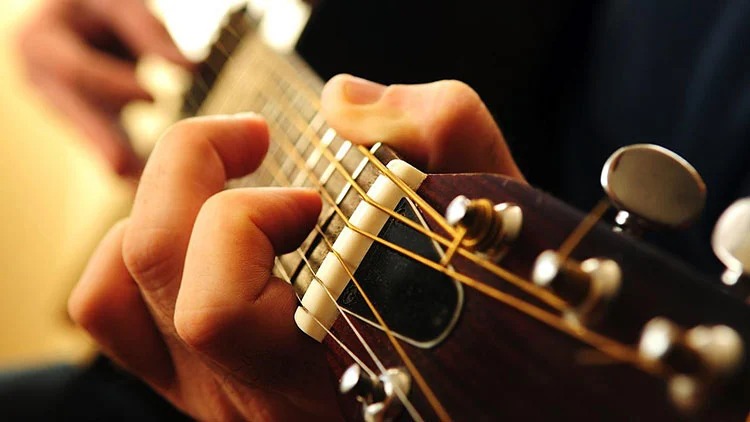 lợi ích của việc học Guitar